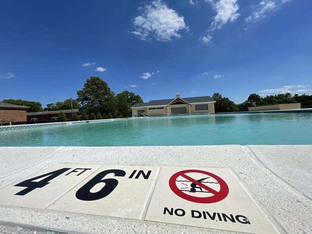 Pool with depth markers and no diving warning