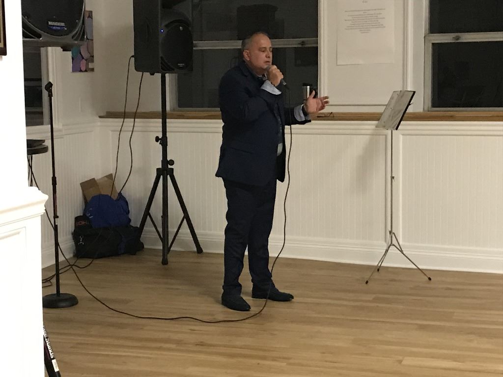 Bocelli singing with eyes closed