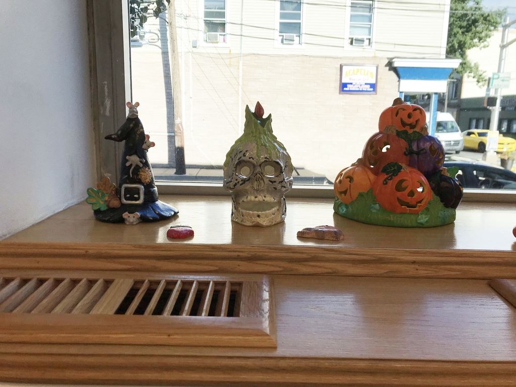 Witch hat, jack-o-lanterns and skull pottery