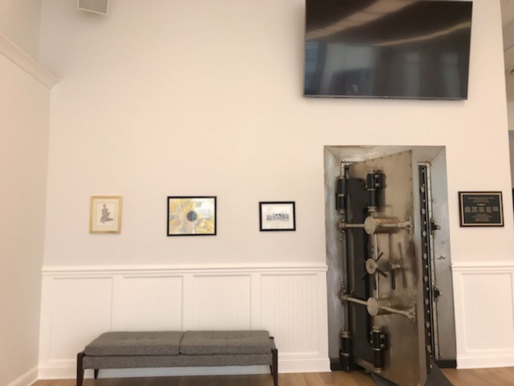Back wall of gallery next to safe