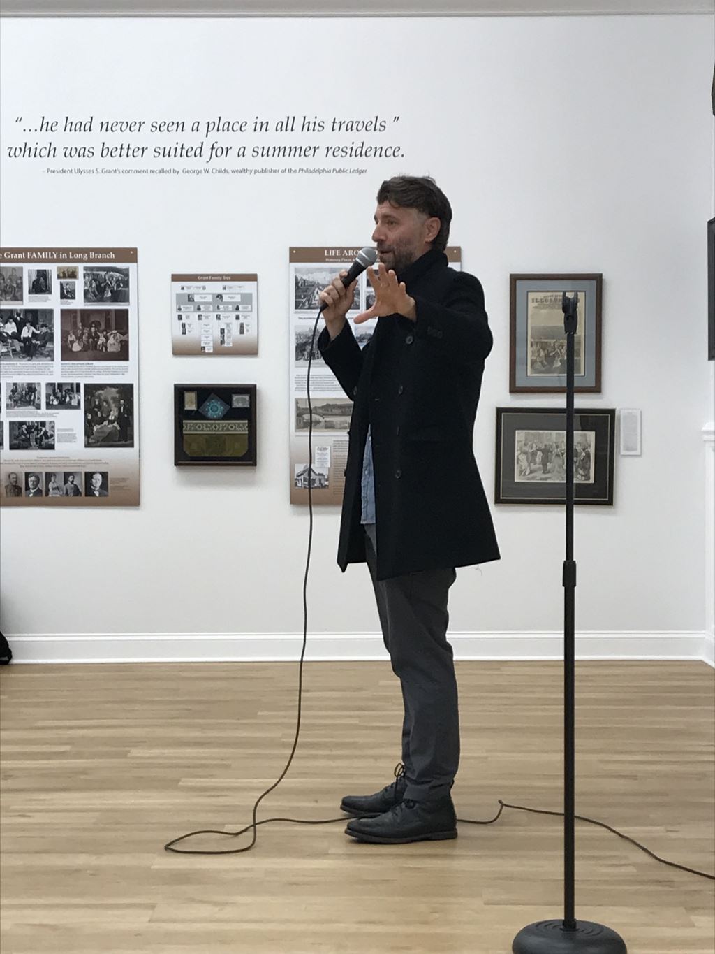 Comedy Night - Vin holding hand to side