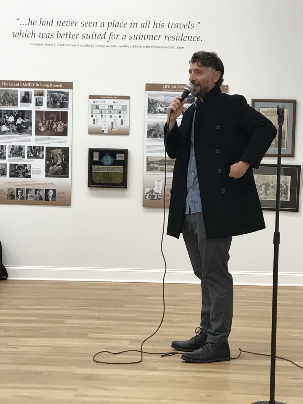 Comedy Night - Vin smiling behind microphone