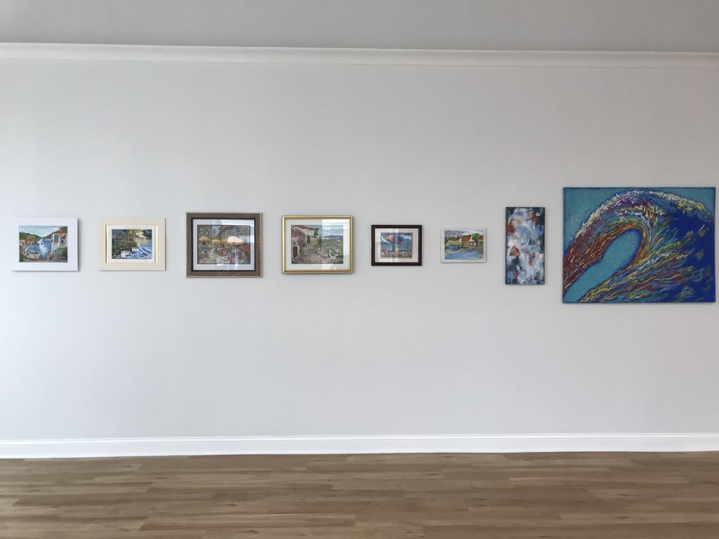 Paintings on the wall of the gallery