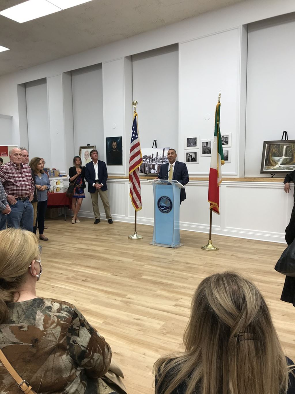 Man in suit at podium